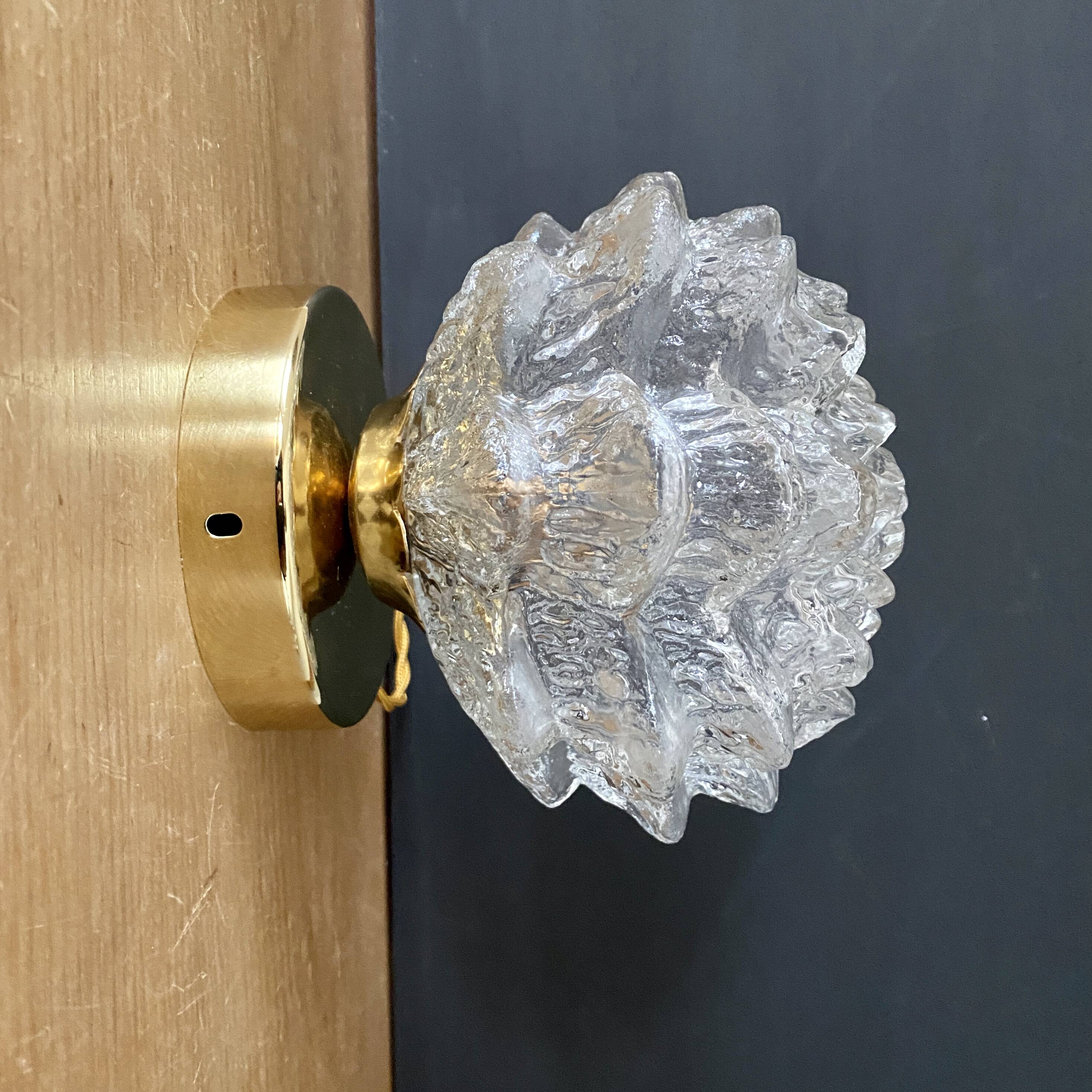 Vintage globe wall or ceiling light in molded glass in the shape of a flower
