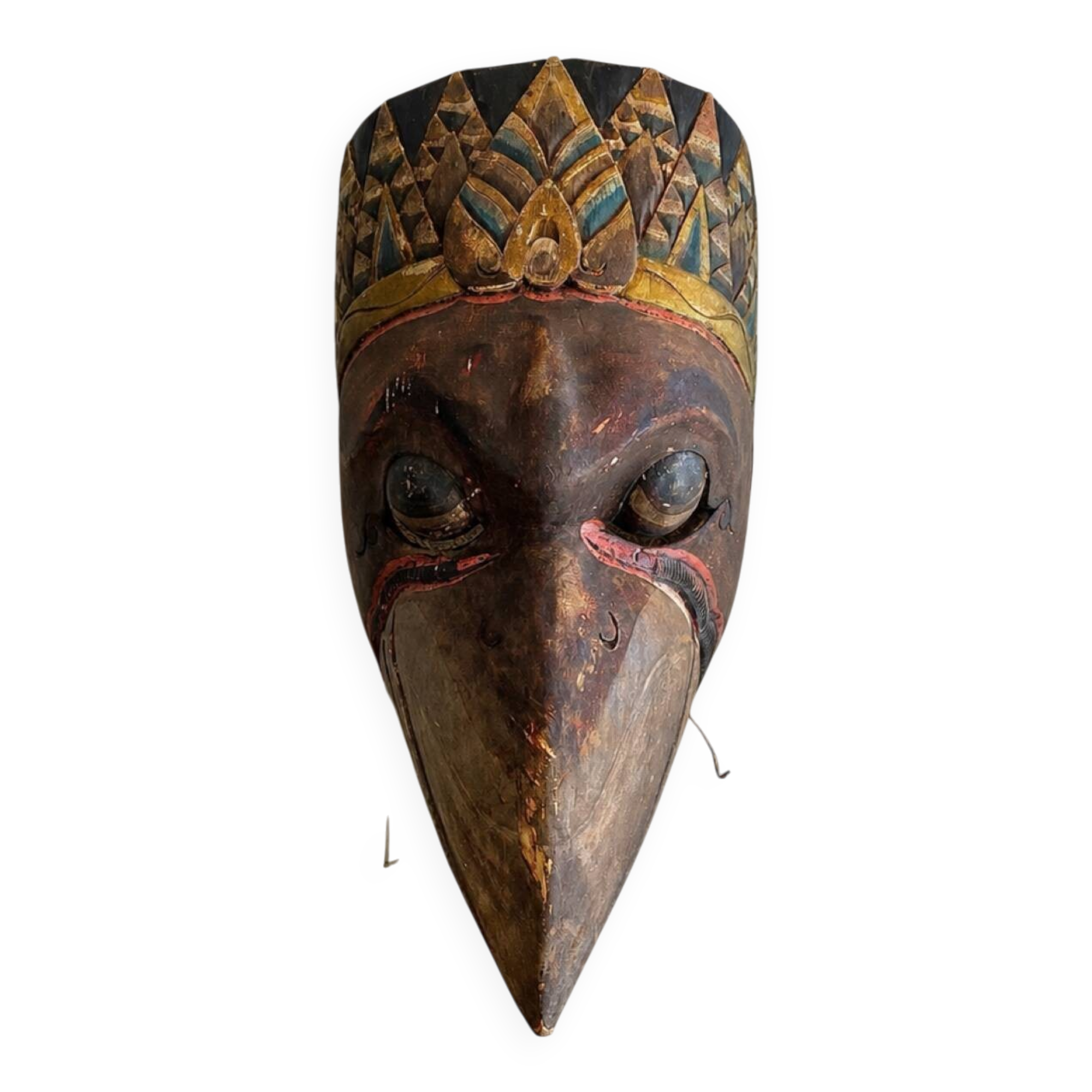 Grand traditional Indonesian mask carved from wood.