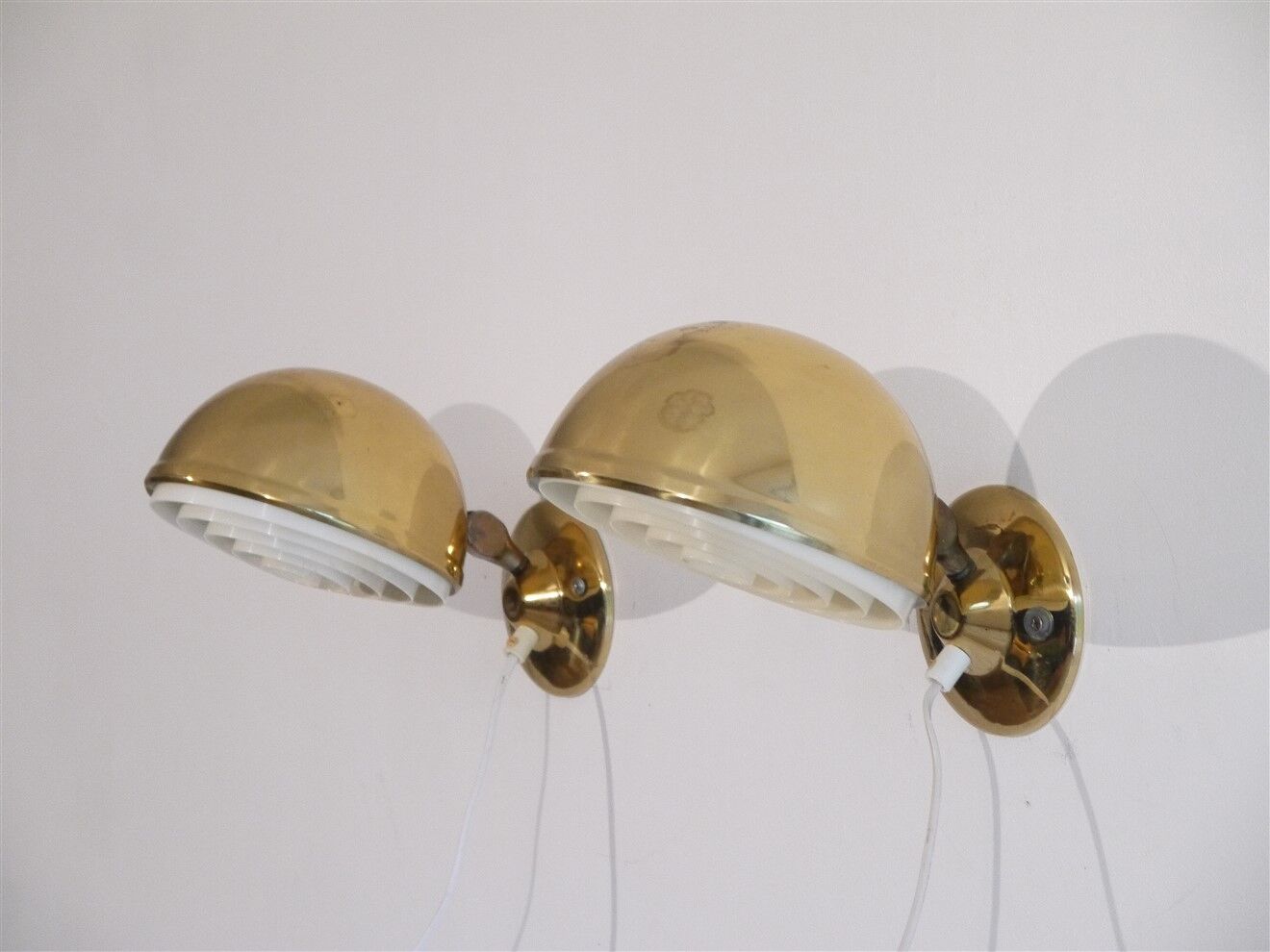 Pair of Danish brass wall lamps by Knud Christensen 1970