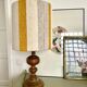 Large vintage lamp with turned wooden base, wool and rope striped lampshade