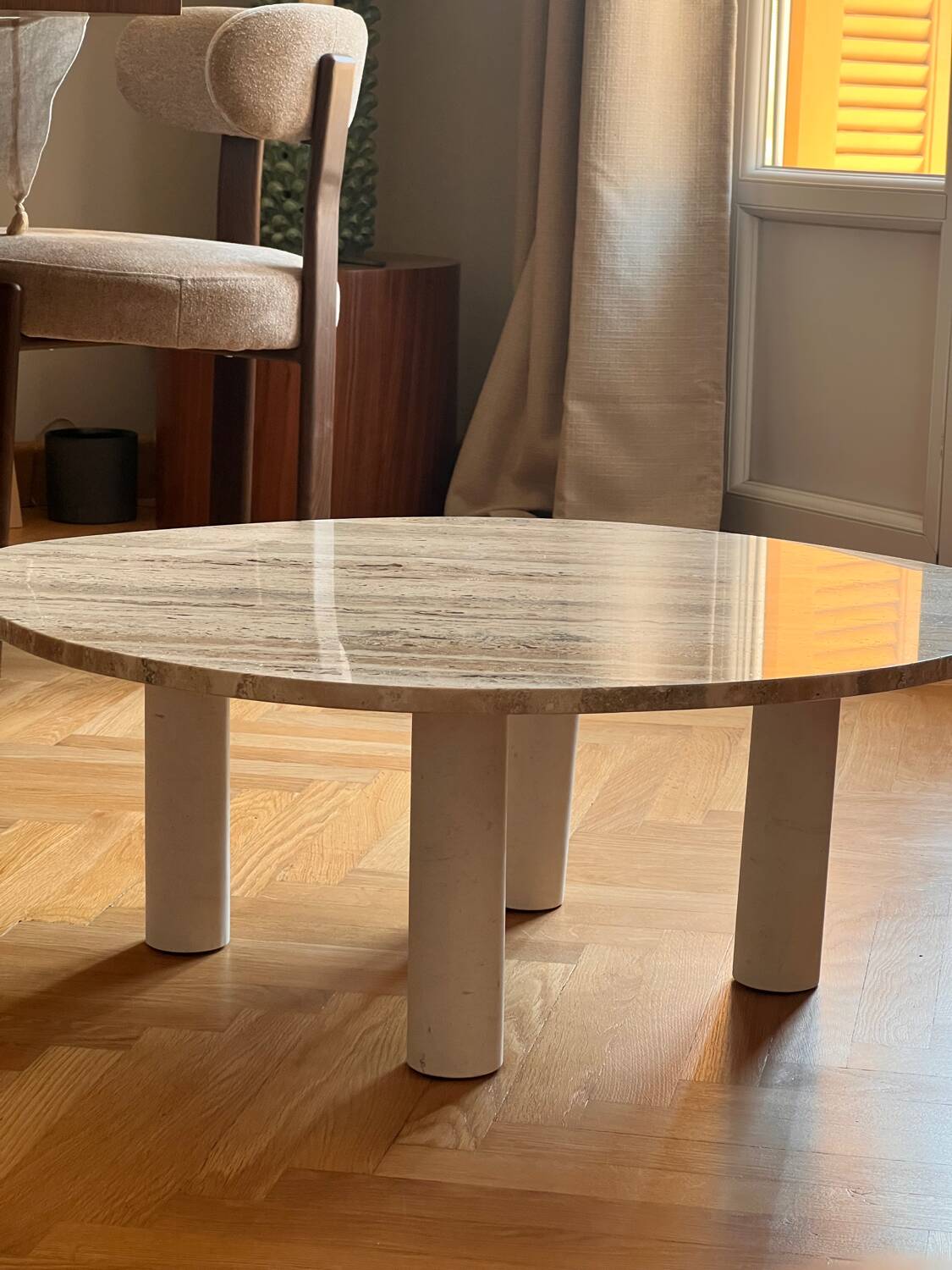Organic coffee table in travertine.