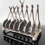 Tennis toast holder