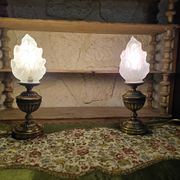 Small globe lamp with flame and brass base for oil.