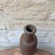 Old handmade terracotta bottle