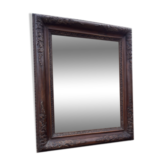 Large carved wooden mirror