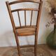 Wooden chair with cane seat