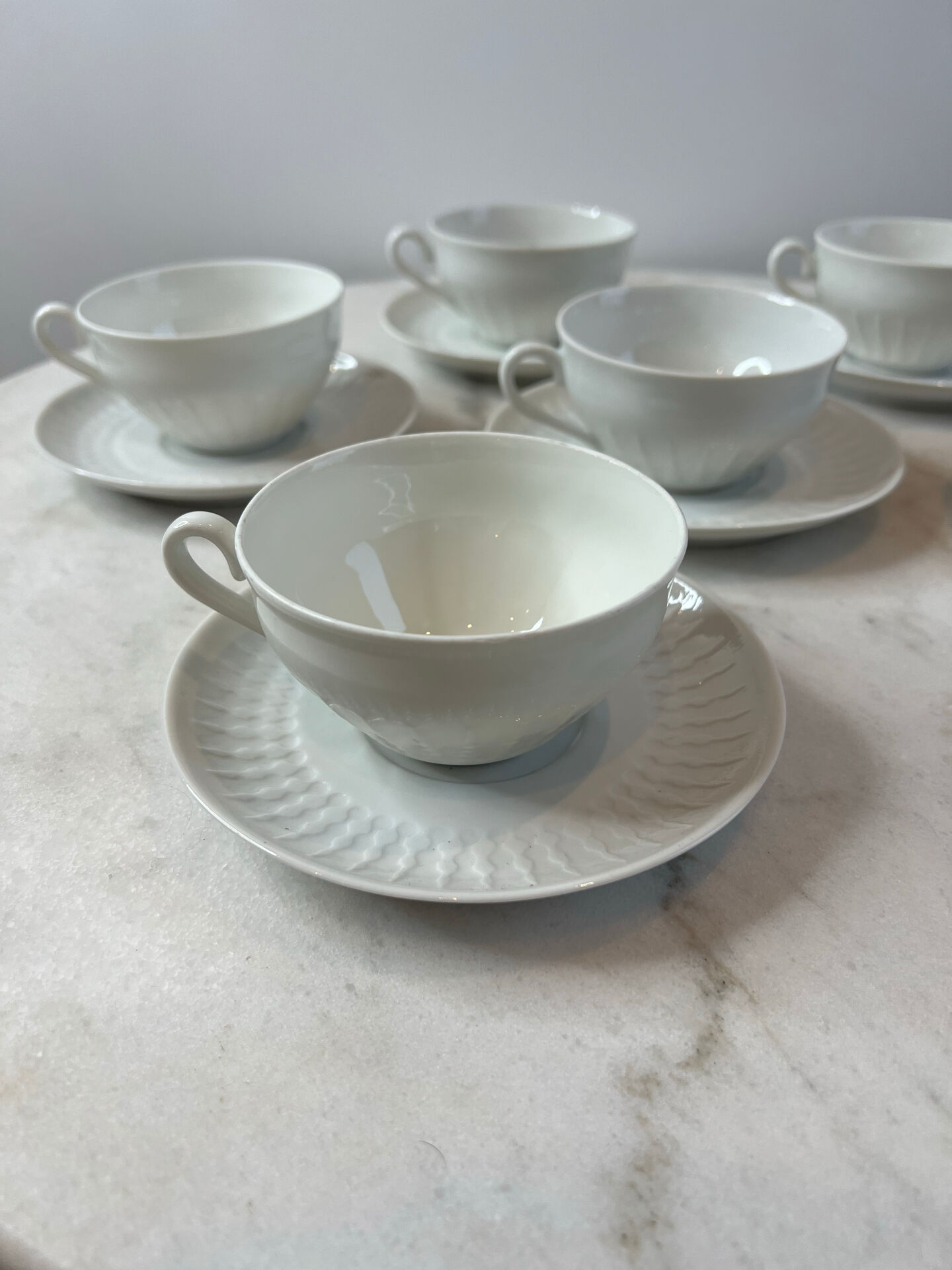 Set of 4 porcelain cups and saucers F. Chauvigny