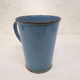 Old blue enamelled pitcher with spout