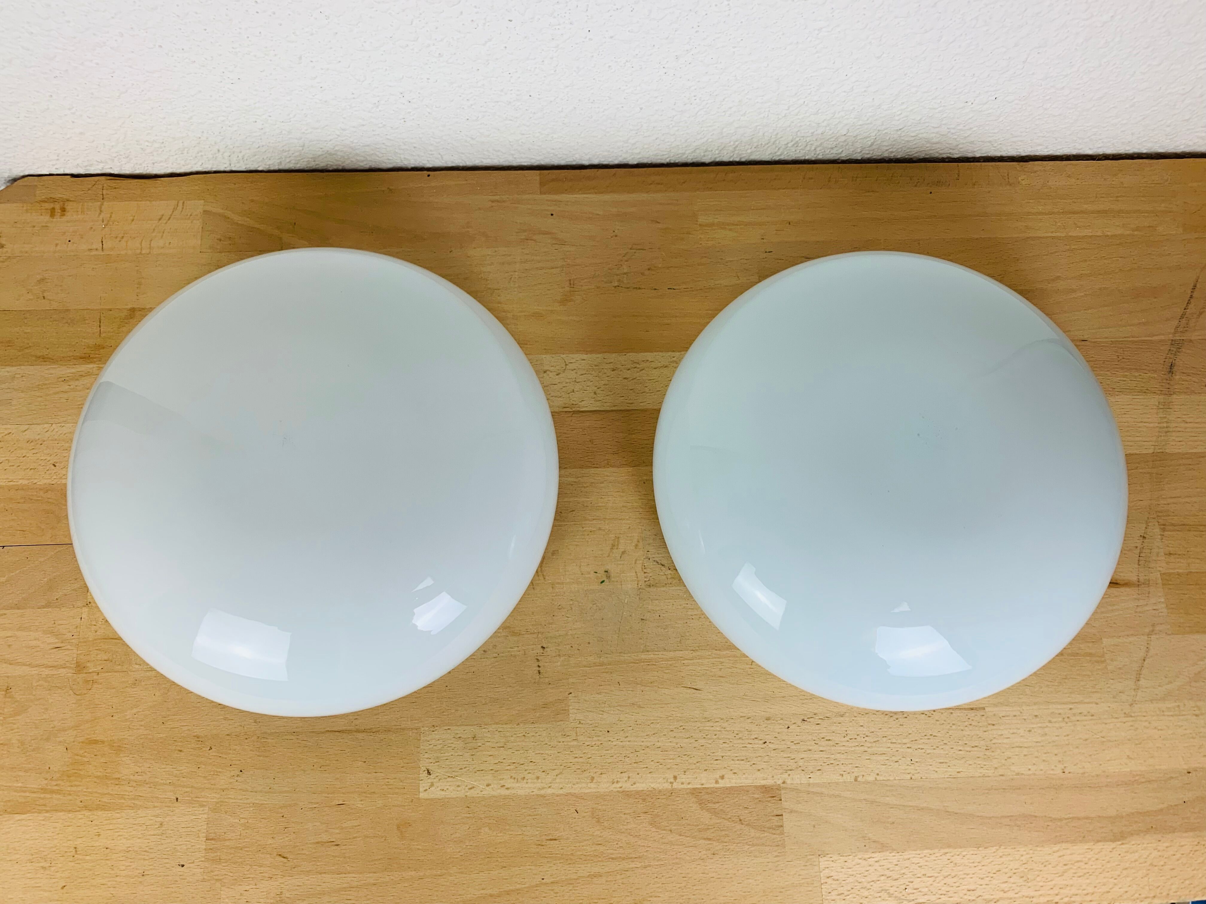 Pair of opaline wall lamps Regent half spheres 29 cm