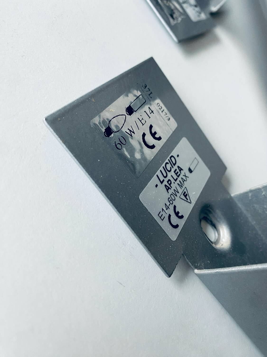 Pair of Lucid designer wall lights