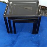 Black nesting tables by Pierre Vandel