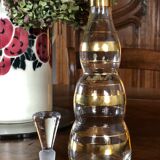 Liquor carafon with golden stripes