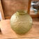 Vase boule art déco en verre dépoli jaune ocre