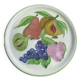 Decorative plate to hang, fruit model, in enamelled ceramic, Les Fruits, signed Luciano
