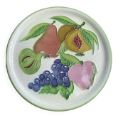 Decorative plate to hang, fruit model, in enamelled ceramic, Les Fruits, signed Luciano
