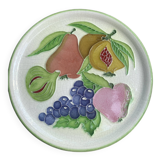 Decorative plate to hang, fruit model, in enamelled ceramic, Les Fruits, signed Luciano