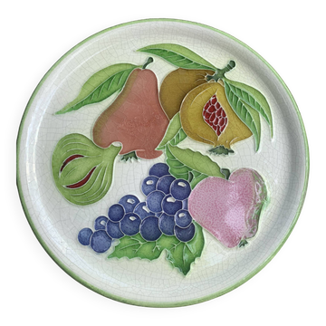 Decorative plate to hang, fruit model, in enamelled ceramic, Les Fruits, signed Luciano
