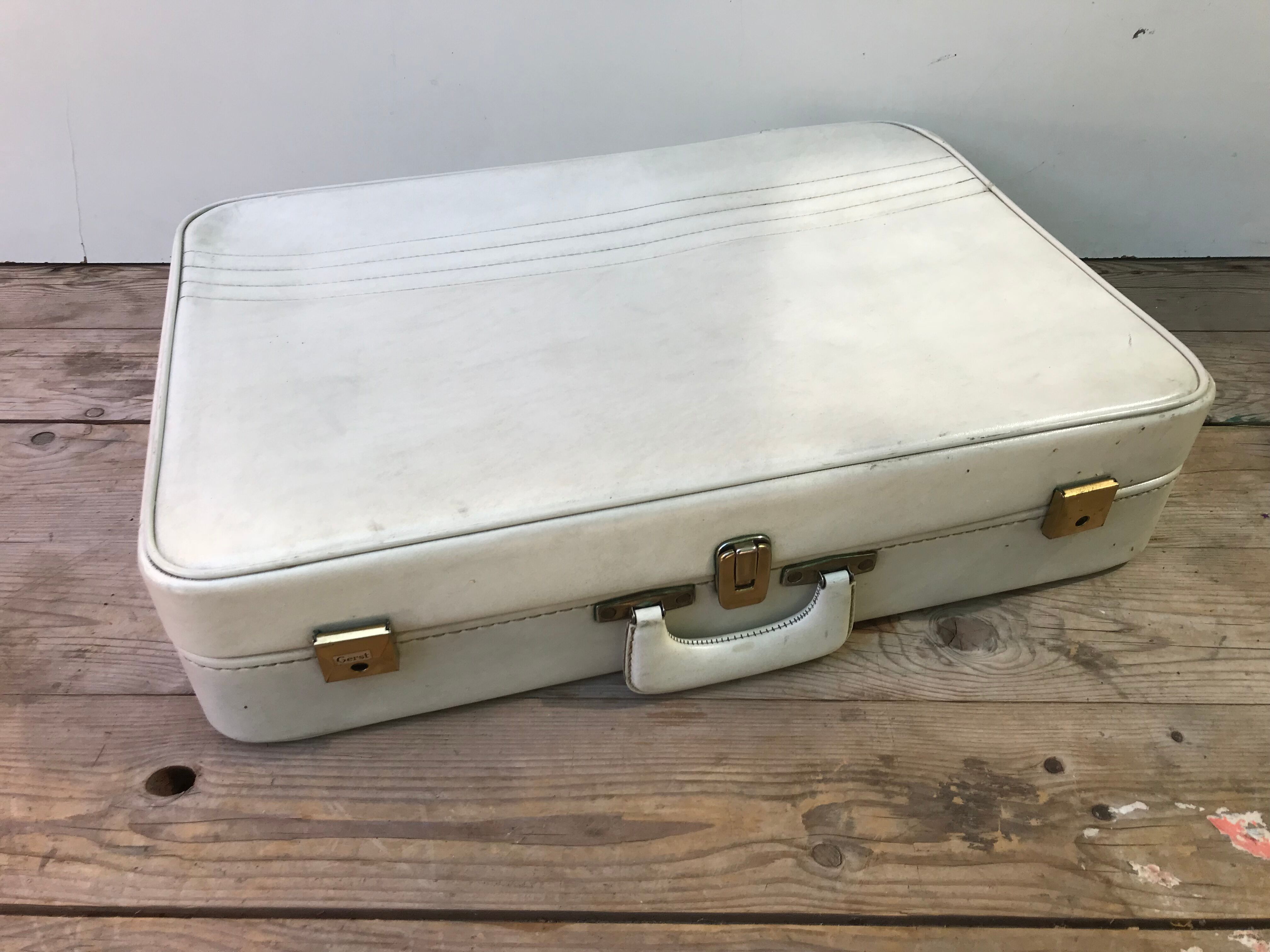 Old white leather case with vintage 70s leather handle