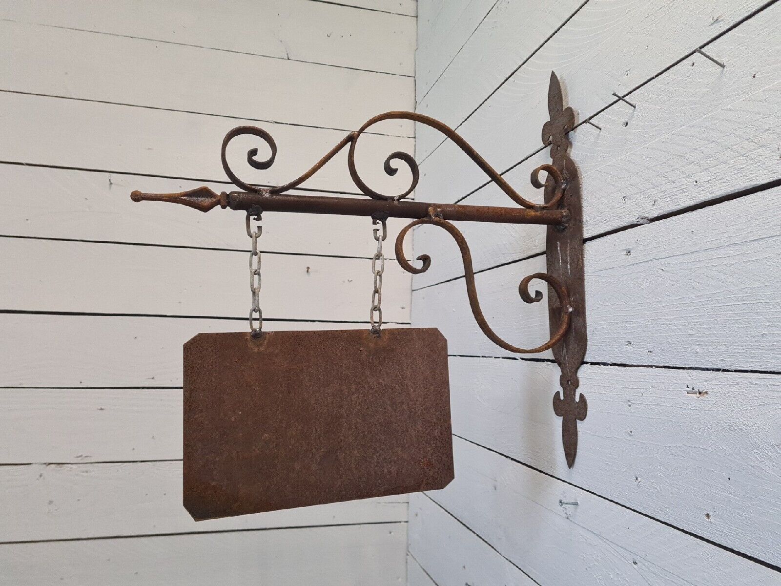 Wrought iron trade sign