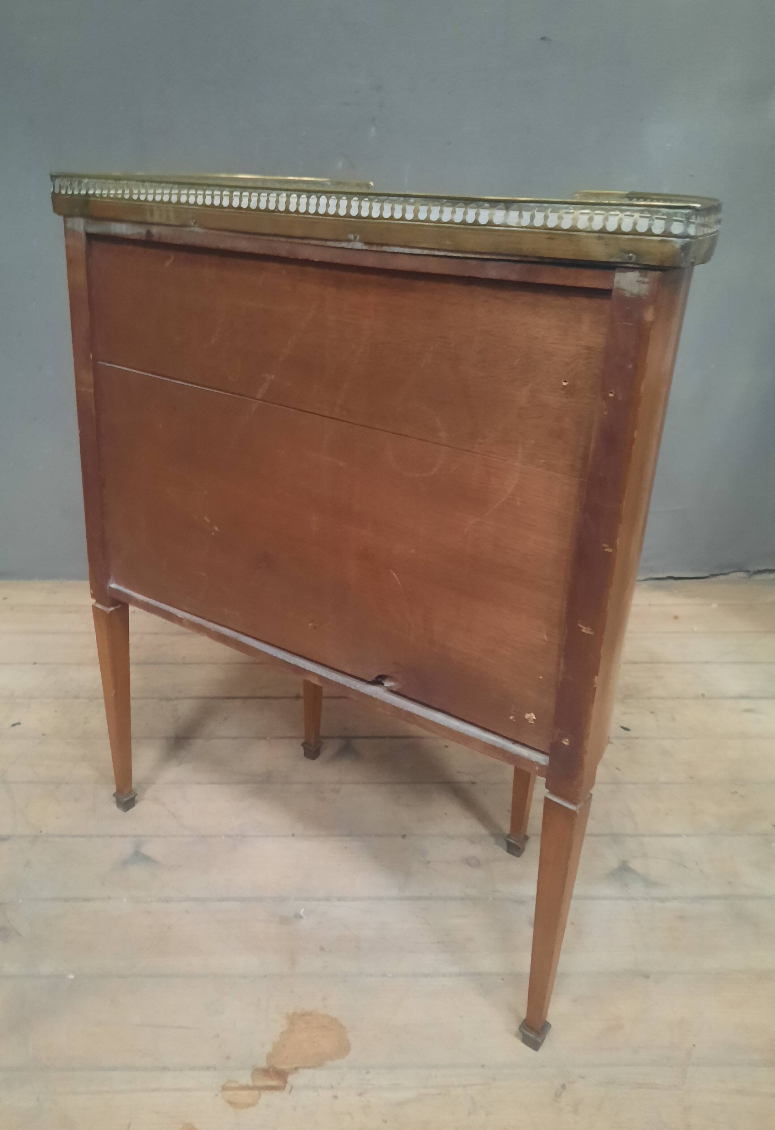 Small Louis XVI style chest of drawers with rounded sides