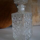 Vintage whisky decanter in chiseled glass