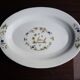 Old large oval serving dish in Moustiers earthenware.