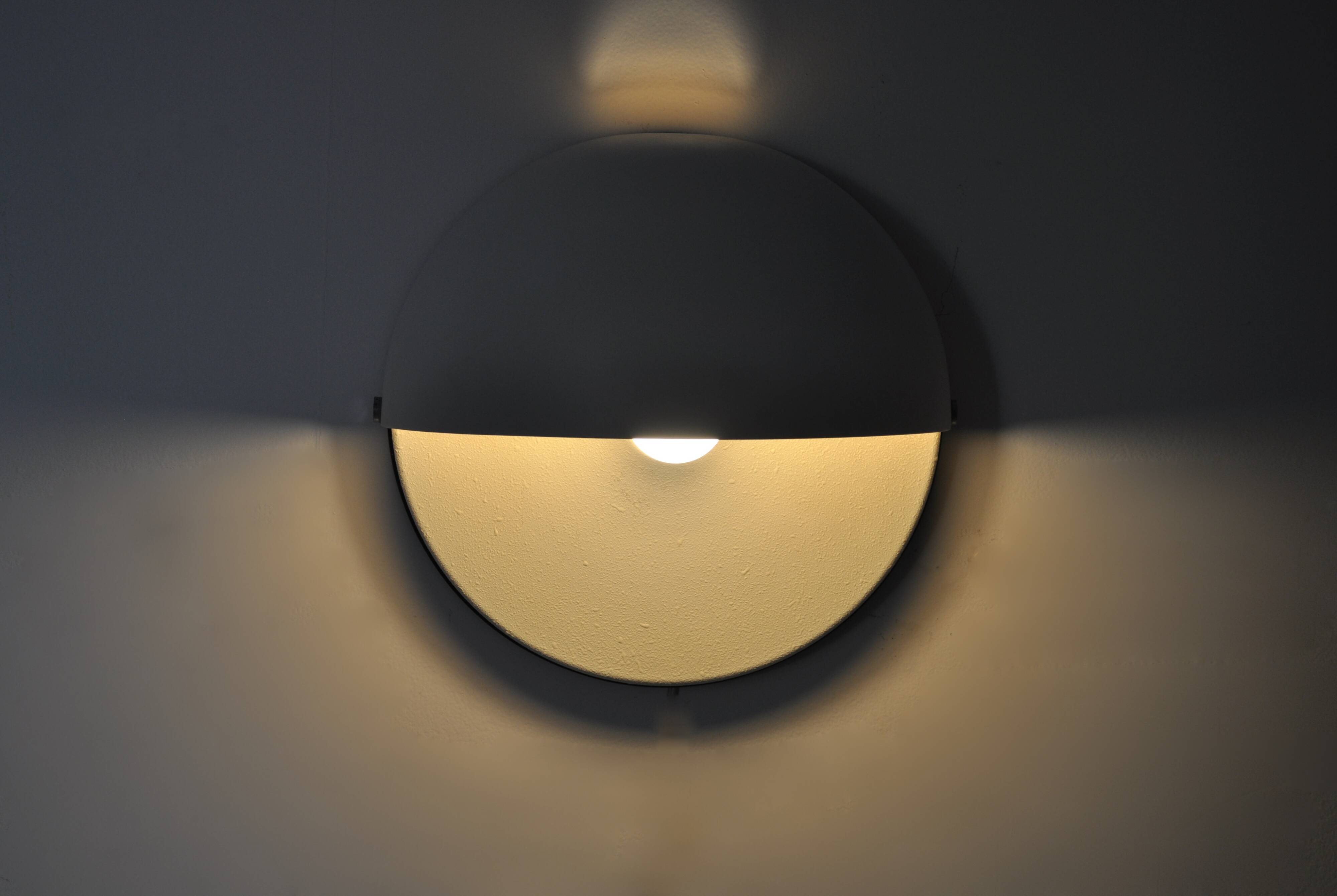 Large Mezzanotte wall lamp by Harvey Guzzini, 1970s
