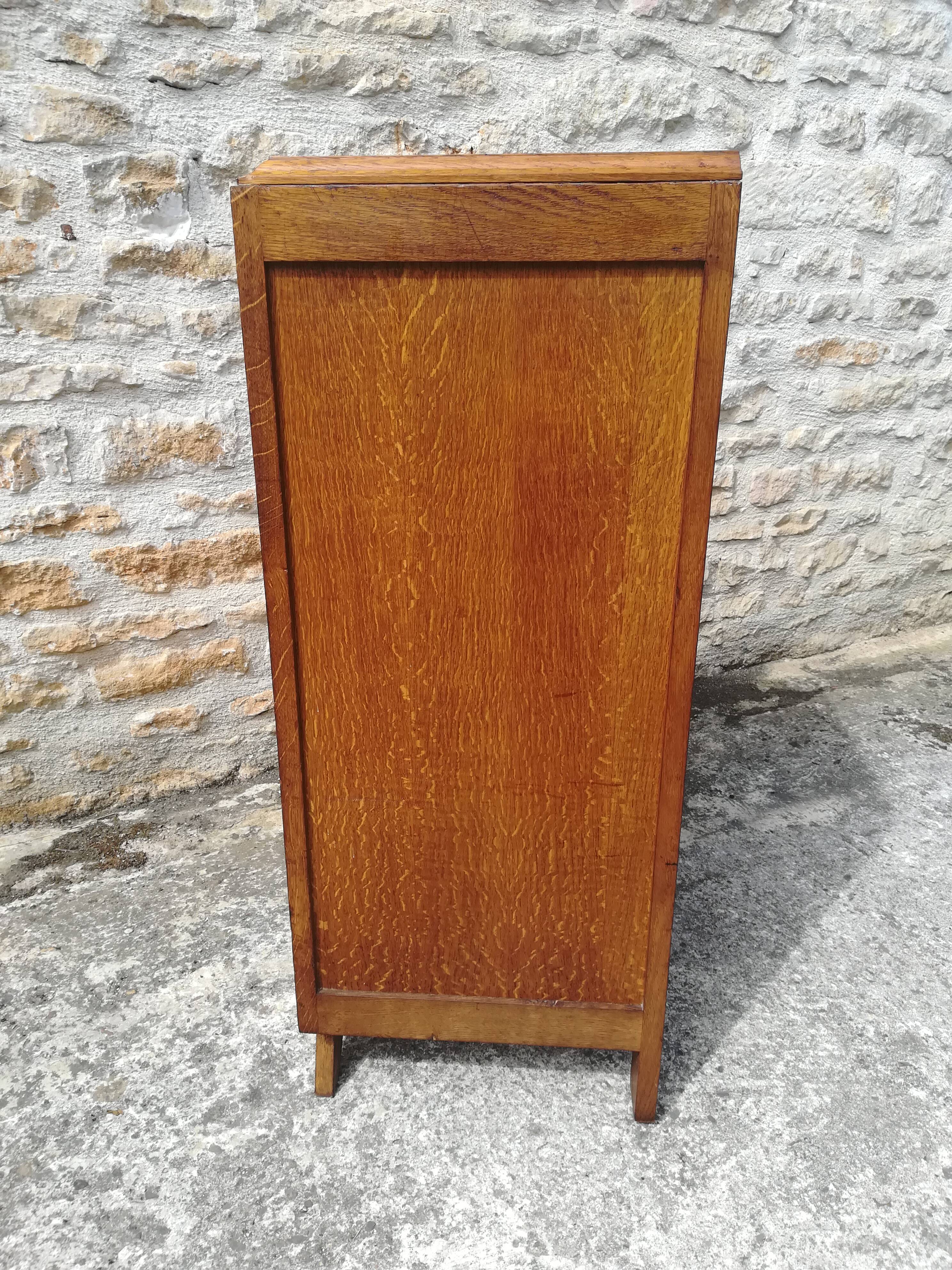Commode en chêne a 5 tiroirs