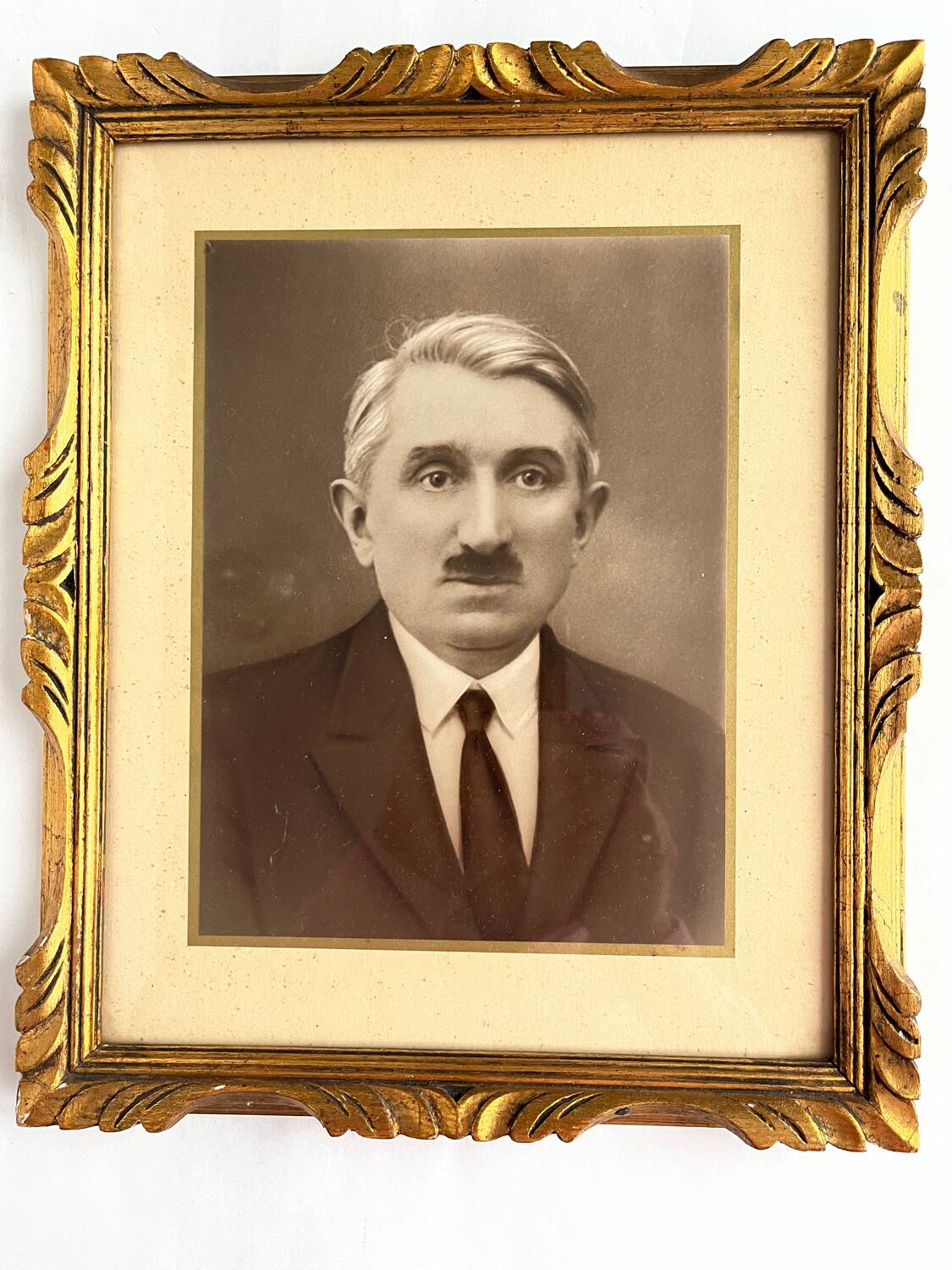 Old photo framed under glass