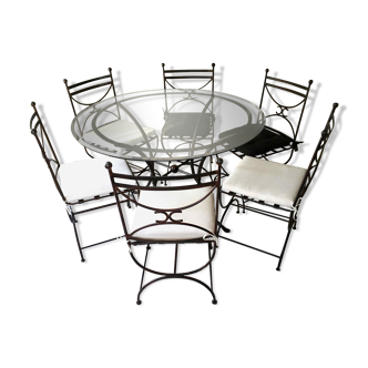 Table and 6 wrought iron chairs