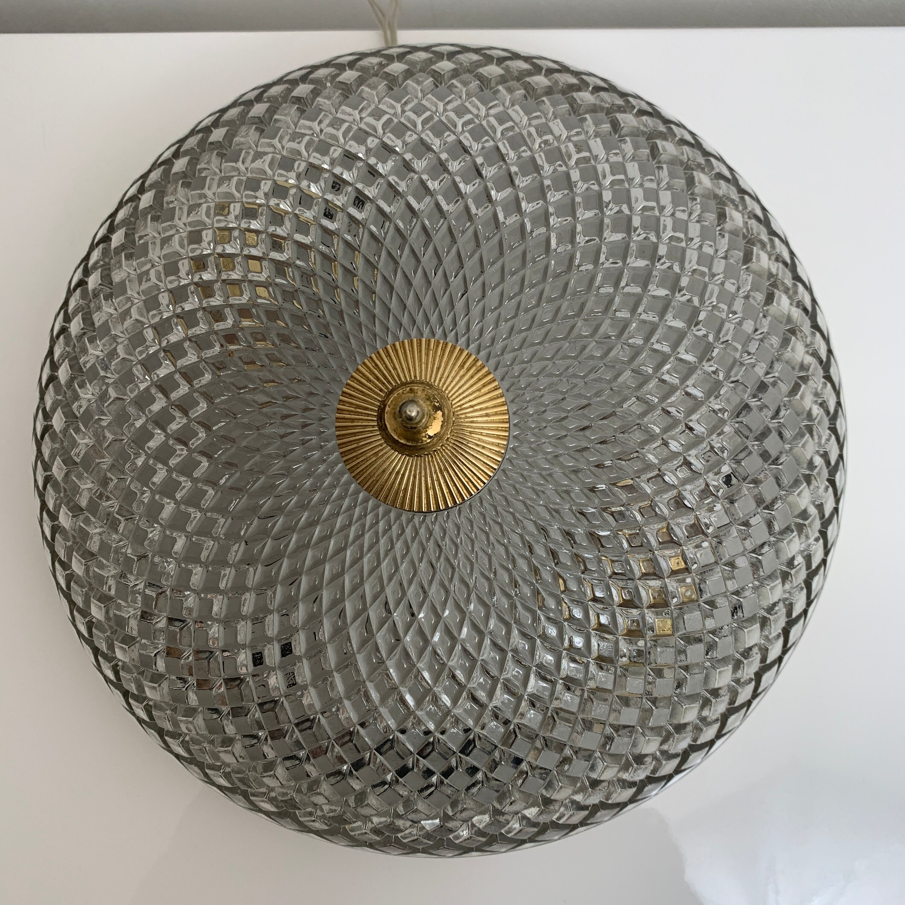 Ceiling lamp in molded glass and gilded metal