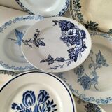 8 ironstone plates from the 19th century in blue camaïeu, mixed manufacturers.