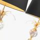 Pair of marble and brass palm lamps by Baker SA