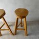 Pair of high bar stools, tripods, in solid wood
