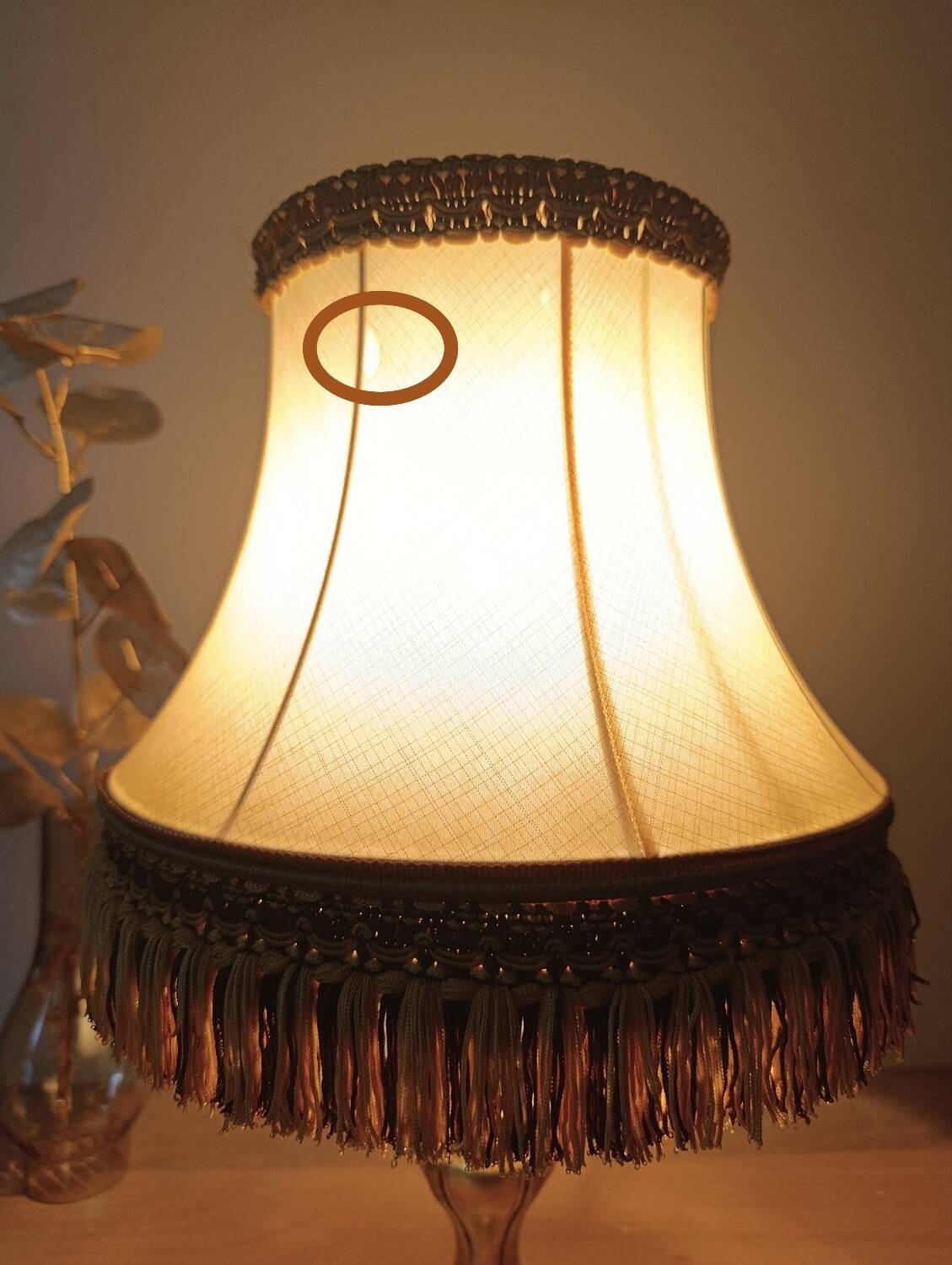 Chic retro lamp with a bronze pagoda fringe shade, 1950.