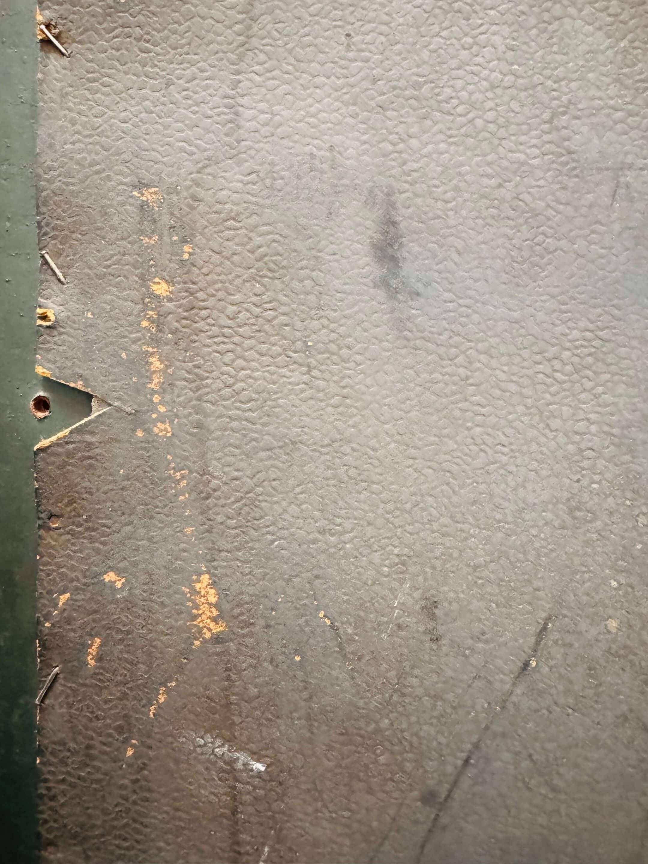 Antique full-length wall mirror in carved wood