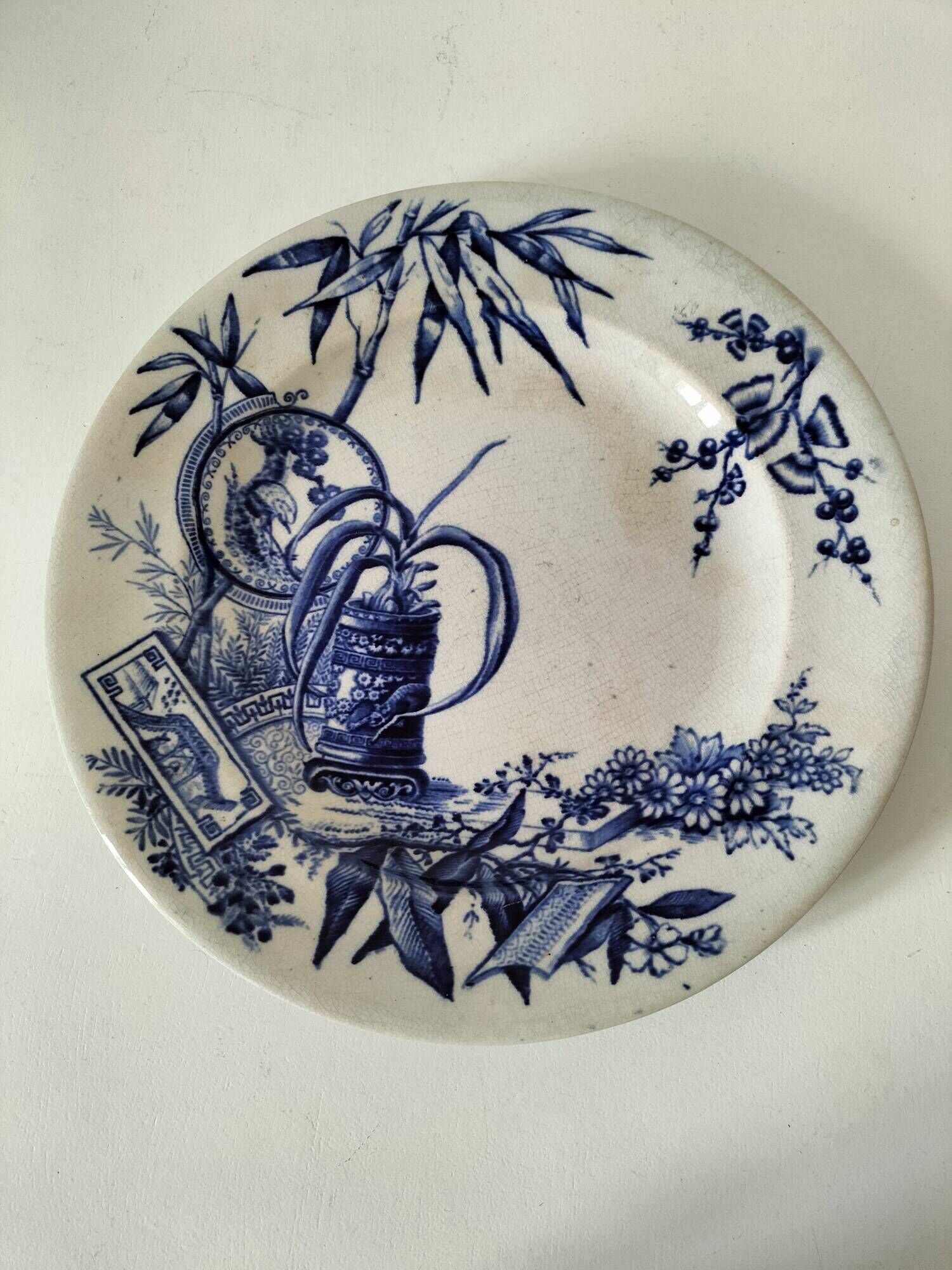 Antique plate with Chinese blue oriental decoration from the late 19th century.