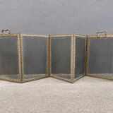 Antique fireplace screen in copper and brass from the 19th century.