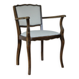 1950s bridge-style armchair