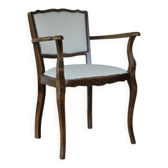 1950s bridge-style armchair