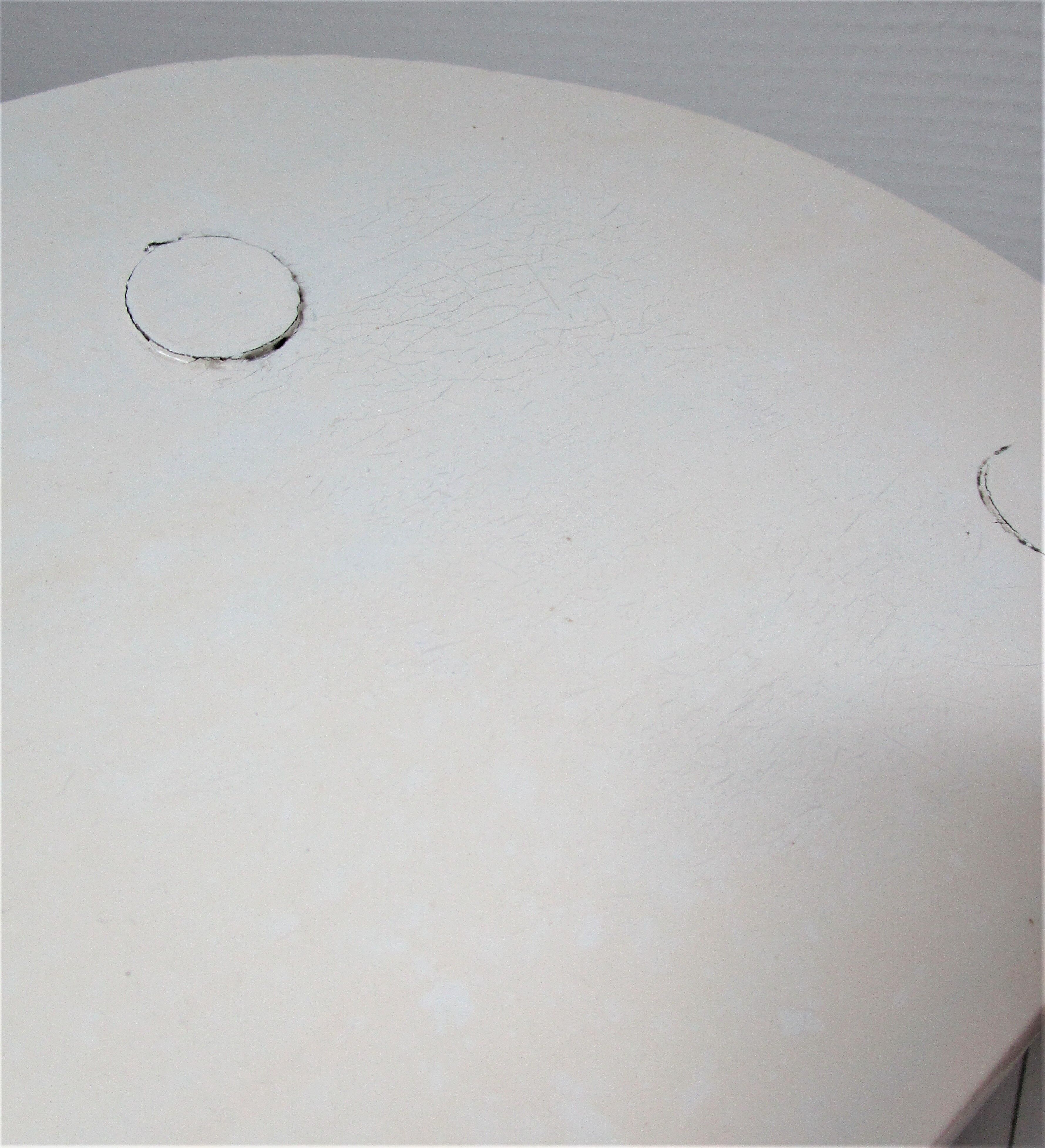 Two vintage tripod solid wood stools