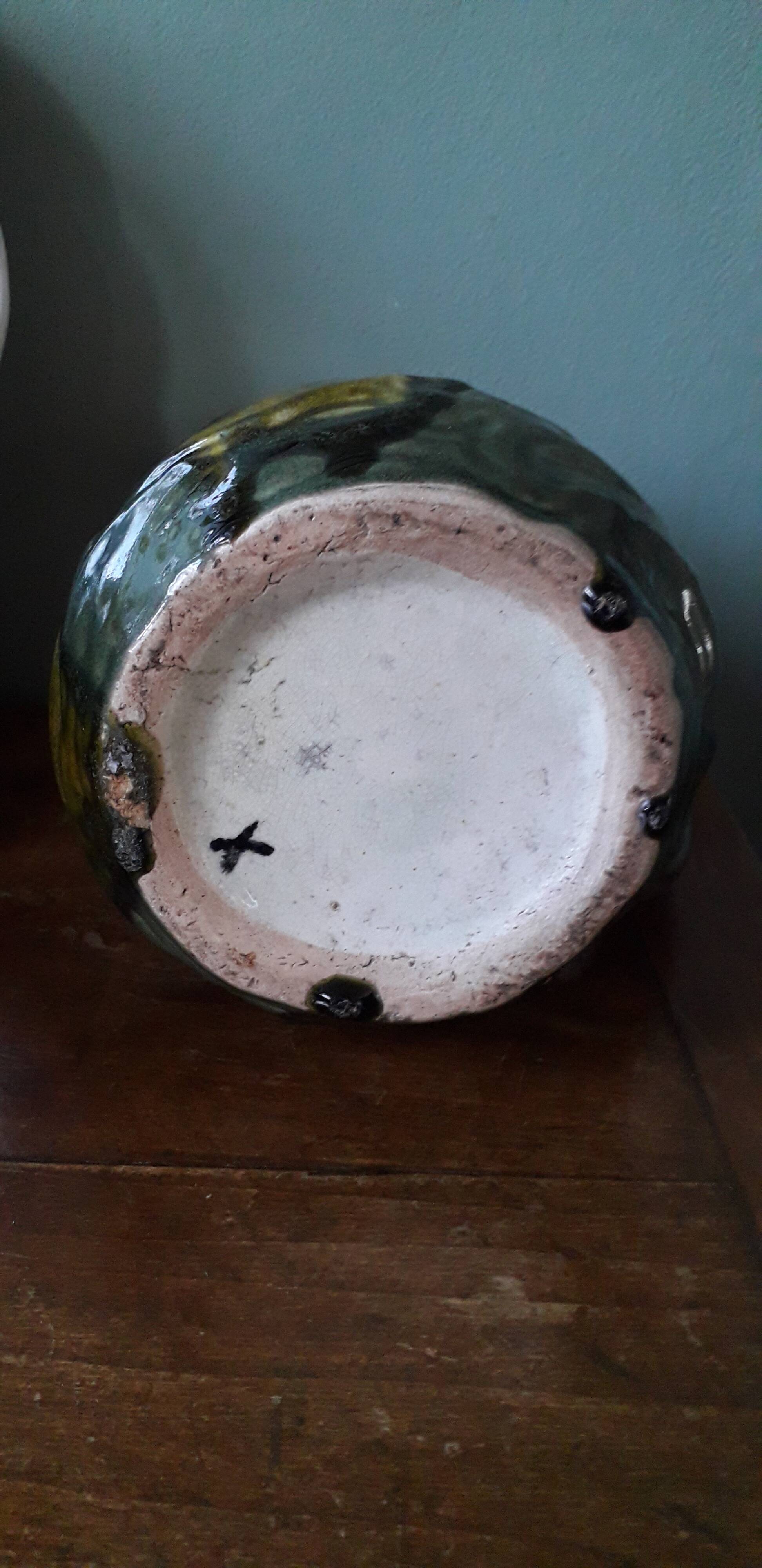 Slip vase with floral decoration