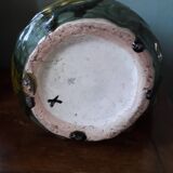 Slip vase with floral decoration