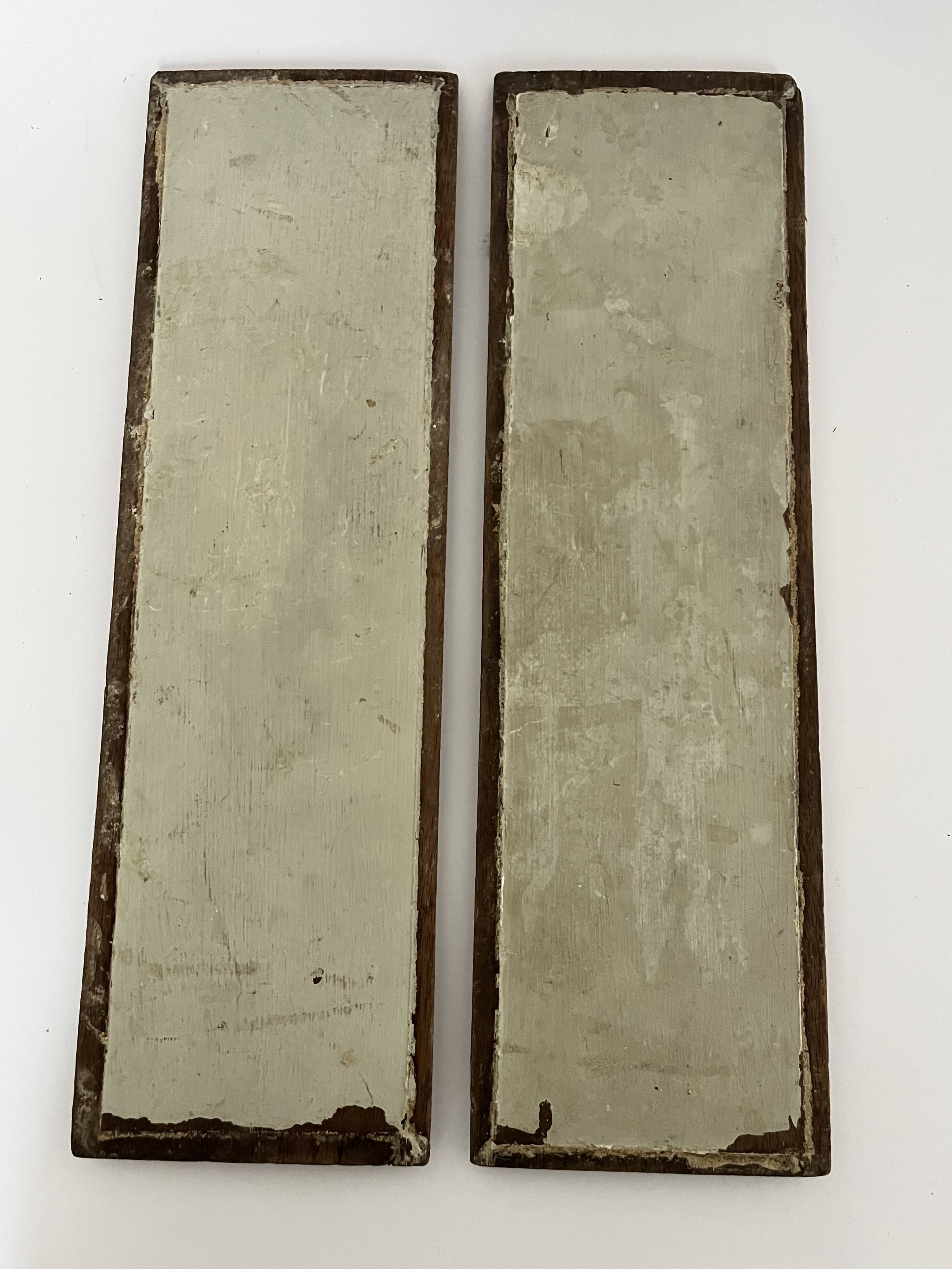 Pair of carved wooden panels - No. 1