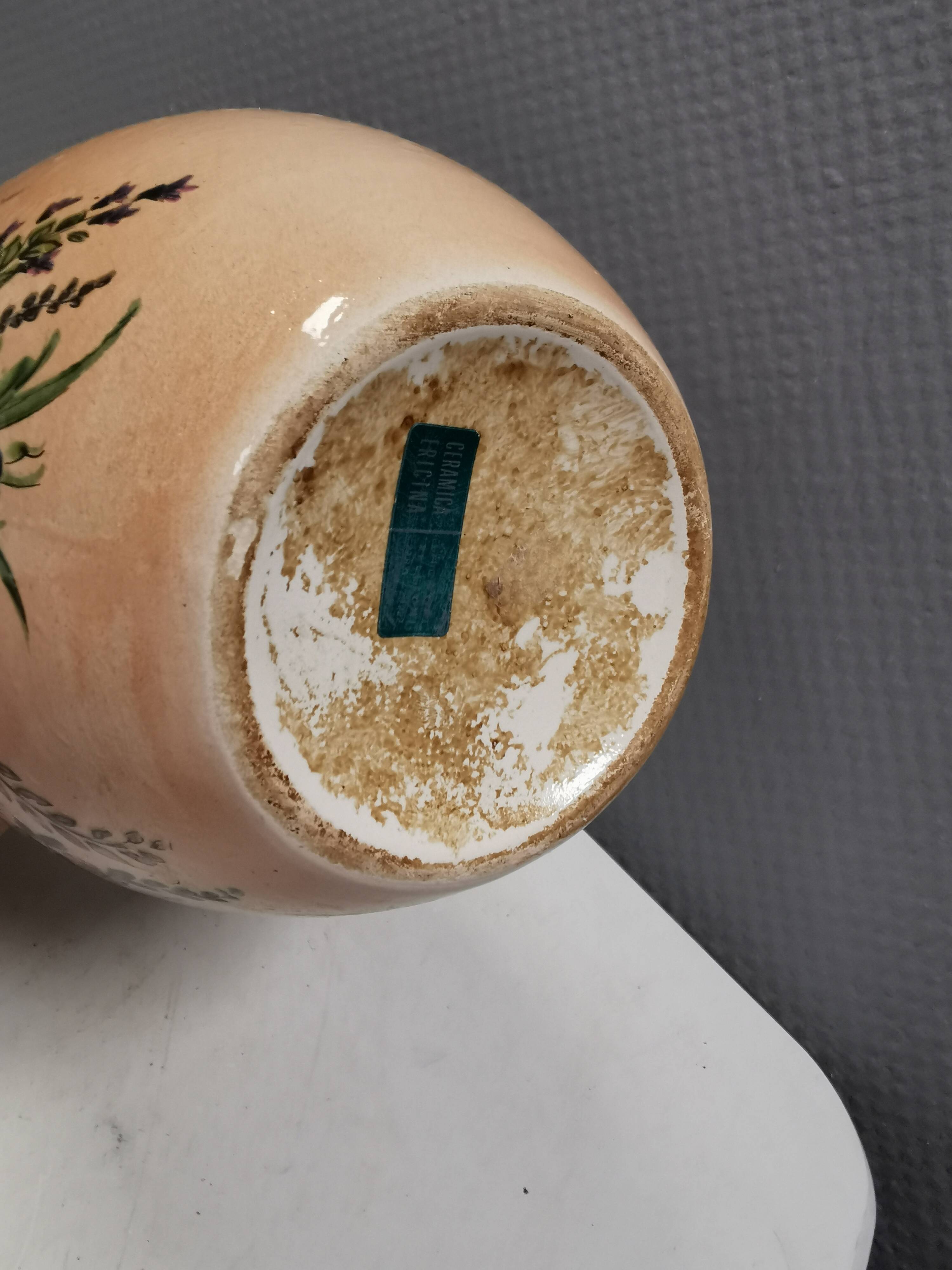 Italian vase from the 70s, in a delicate pink color with floral decoration.