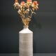 White enamelled sandstone bottle-shaped vase