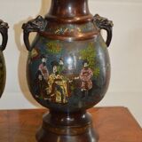 Asian vases in partitioned bronze