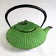 Flat cast iron teapot