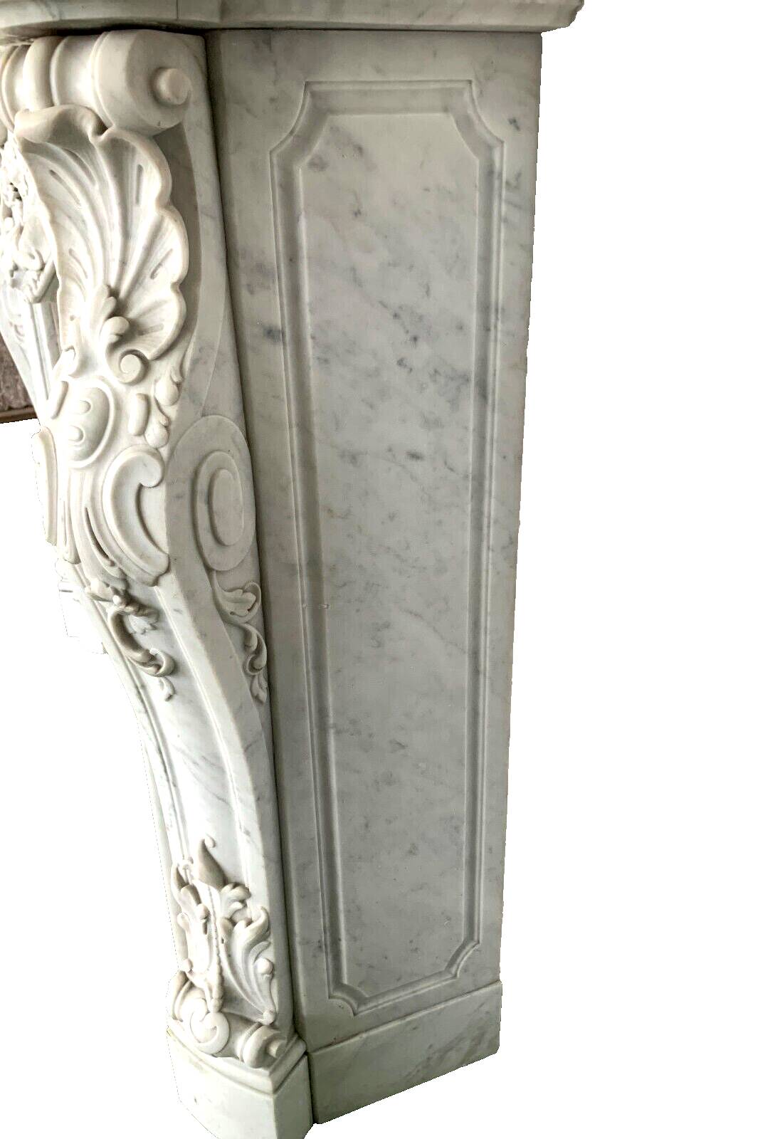 Louis XV style fireplace in white Carrara marble 19th century