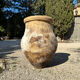 Ancient terracotta pottery jar
